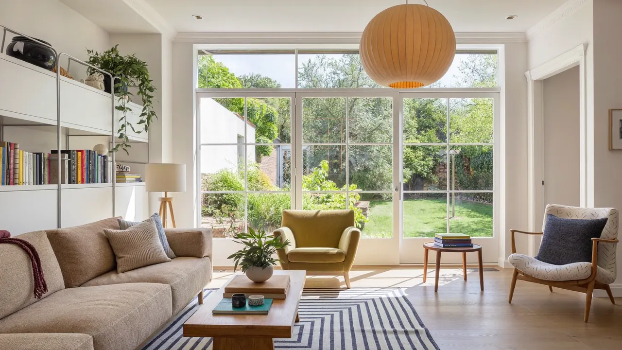 Bright living room with finished new windows letting in daylight