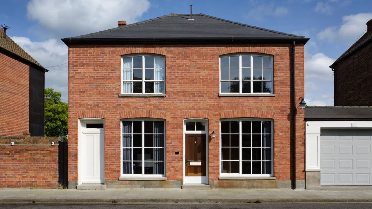 Terraced house with a full set of newly fitted white windows